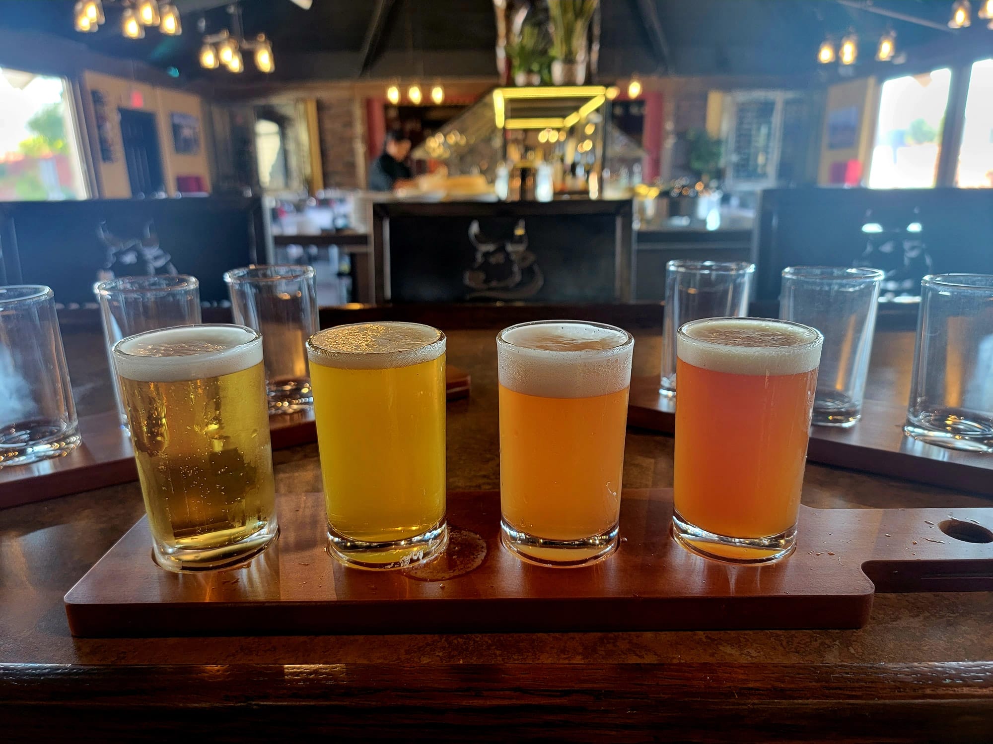 four beer glasses