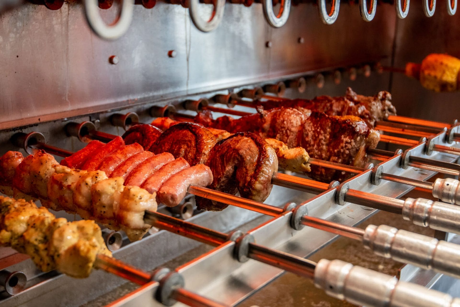 Boiada_Spokane-8398 cooking meats on skewers